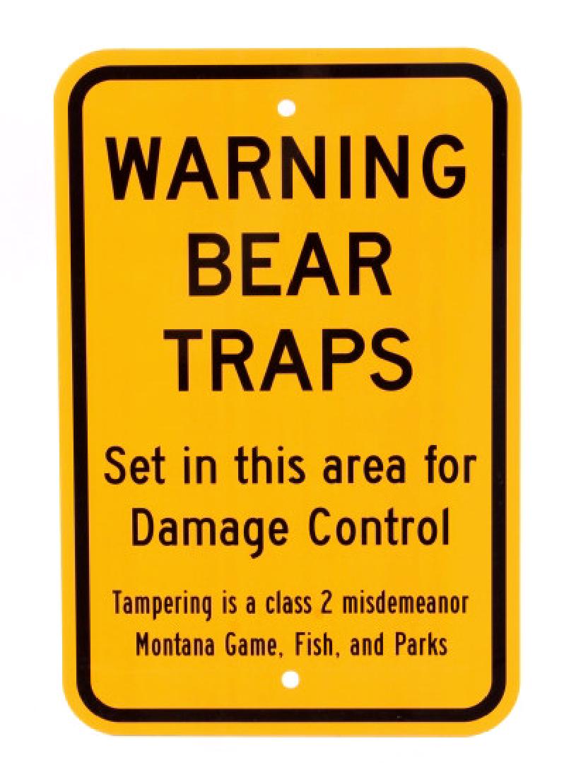 Montana Game, Fish, & Parks Bear Trap Sign: This lot features a Montana bear trap sign. This sign was used to designate an area that had bear traps set. The sign was utilized by the Montana Game, Fish, and Parks to warn people that traps were s