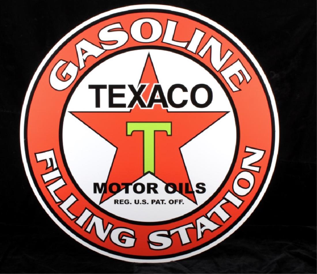 Texaco Motor Oil Advertisement Sign: Offered in this lot we have a Texaco motor oil advertisement sign. The sign shows the trademark Texaco star and "T" logo with "Texaco" boldly above the logo. The sign shows a vibrant red, green, white