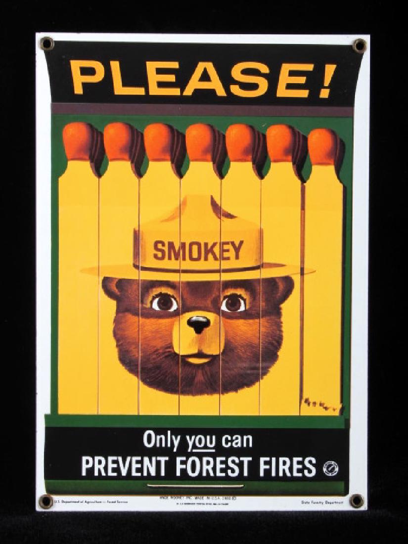 Smokey Bear U.S. Forest Service Porcelain Sign: This is a Smokey Bear porcelain enamel sign. Smokey Bear was adopted by the U.S. Forest Service back in the 1940's as part of their campaign to prevent forest fires. This sign shows a book of matches