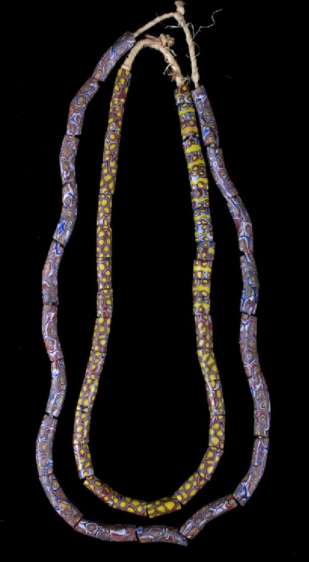Set of Two Millefori African Trade Beads: Featured in this lot we have a pair of Millefiori African trade beads. These are all antique beads showing wonderful coloring and would be traded by the Tribal people of Africa. These include a total 
