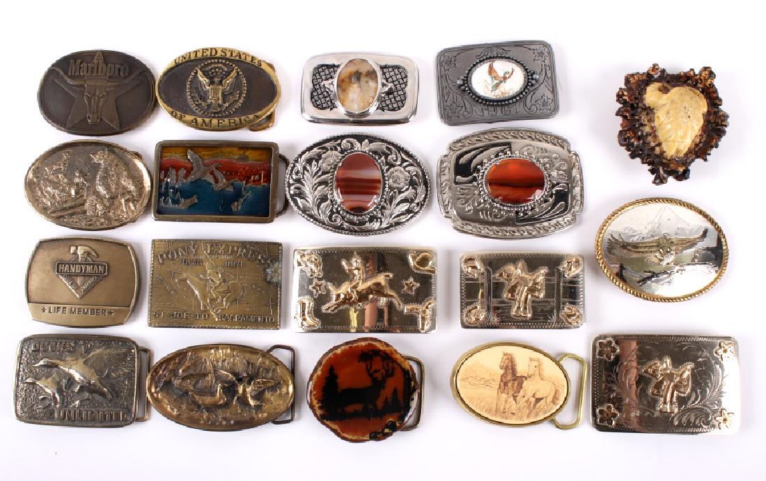 Collection of Western Belt Buckles: For your consideration in this lot we have a collection of western belt buckles. The collection consists of 19 belt buckles, 7 brass, 4 silver and gold, 3 made of silver with a large agate in the cent
