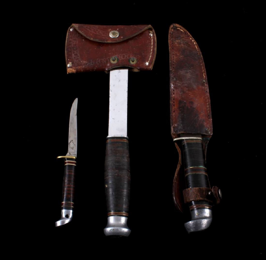 Western and Kinfolk Knives and Hatchet: This lot features two Western hunting knives and one Kinfolk's hatchet. The larger hunting knife comes enclosed in a leather sheath. The leather and the knife show wear. The small Western knife is in