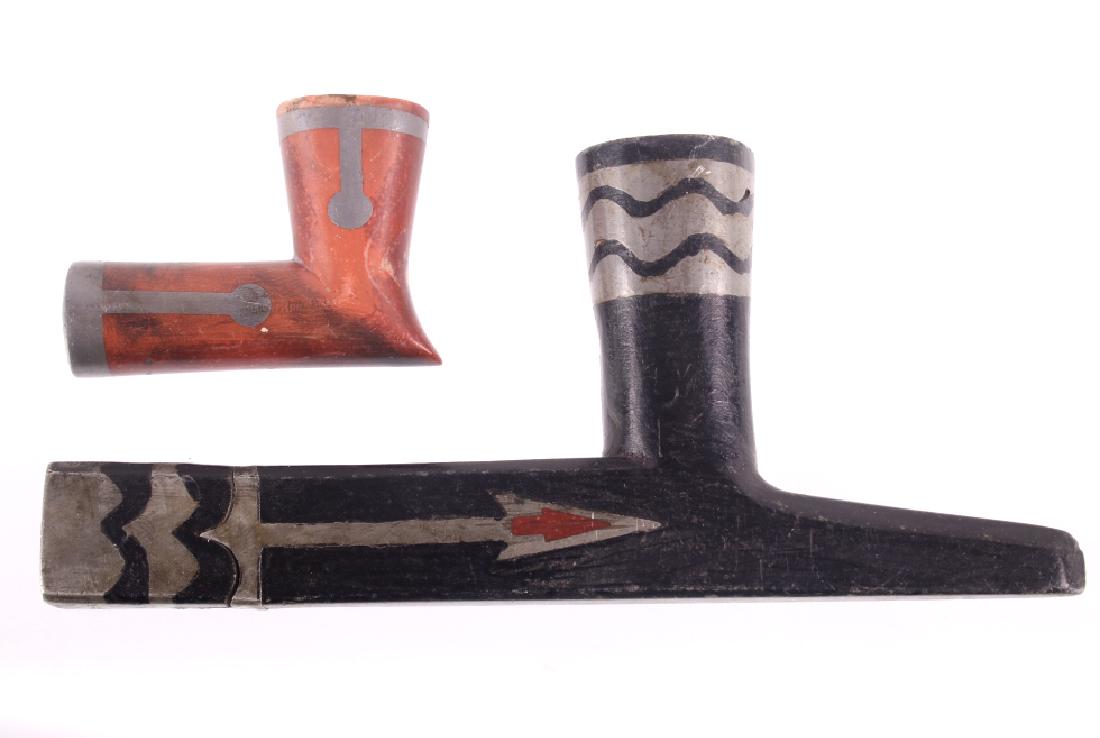 Lakota Sioux & Ojibwa Pewter Inlaid Pipes 19th C.: Offered for sale in this lot contains two authentic original 19th Century artfully pewter silver inlaid American Indian peace pipe bowls. The first example is a large black steatite stone having a T-S