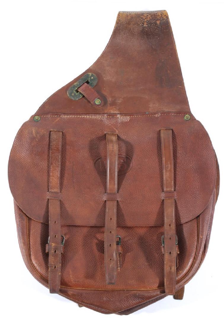 U.S. Military Cavalry Leather Saddle Bags: Featured in this lot we have a U.S. Military Cavalry leather saddle bags originating from the early 20th century. The saddle bags are constructed of a rich brown leather, and utilize brass rigging, an