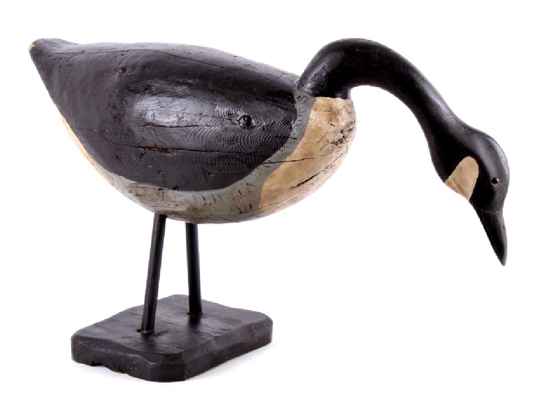 Folk Art Carved and Painted Wood Goose: For your consideration is this wonderful folk art hand carved and painted wood goose. The goose is solid and not hollow; its legs are spindles which fit down into a solid wood base. The goose is paint