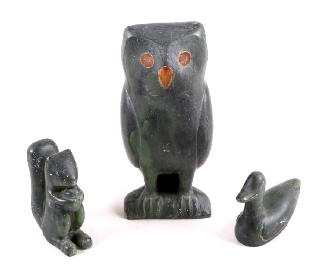 Green Talc Carving Animal Figurines: Included in this lot is a collection of Green Talc carving animal figurines. These pieces were carved by Clarence Cameron, a renown carver in Wisconsin. The sculptures depict an Owl, a Squirrel with a
