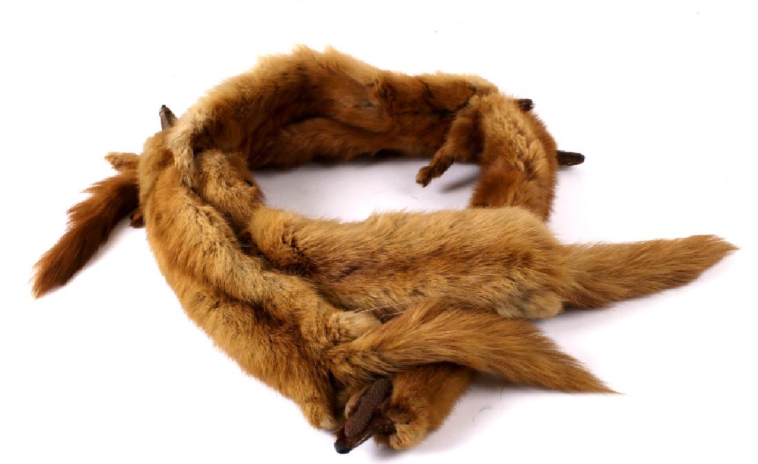Brill's Genuine Mink Pelt Stole: Available for your bidding pleasure is this genuine Mink pelt stole. This stole is made from five Mink pelts by a professional furrier, Brills, in Lansford, PA. The piece shows a beautiful red and bro