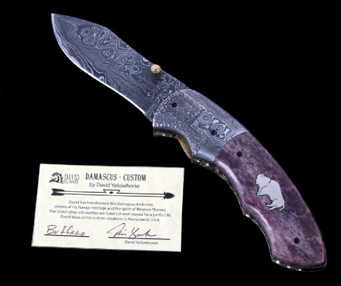 Navajo Dave Yellowhorse Damascus Buffalo Knife: We are proud to be one of the exclusive knife makers to offer David Yellowhorse custom Damascus pocket knives. David Yellowhorse has transformed this Damascus knife into visions of his Navajo heritage