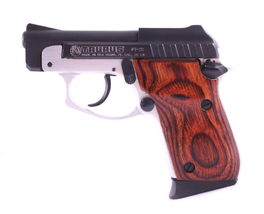 Taurus Model PT-22 Semi-Automatic Pistol: Included in this lot is a Taurus Model PT-22 semi-automatic pistol. This Taurus is chambered in .22 caliber and has a blue'd slide with a nickel frame. The blue'd barrel measures 2 3/4". This pistol u