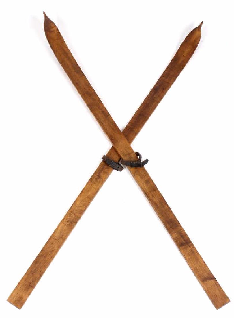 Early 20th Century Wooden Skis: For your consideration in this lot we have a pair of wooden back country skis from the early 20th century. Each of the skis shows a leather binding with a adjustable buckle. The skis would make a wond