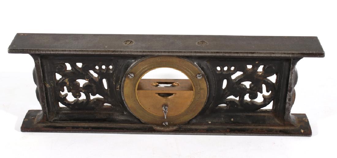Davis Level & Tool Co. Metal Level c. 1867: Included in this lot we have a Davis level and tool company metal level originating from 1867. The piece is made of cast iron with a brass section set into the center. The level shows vine like patter