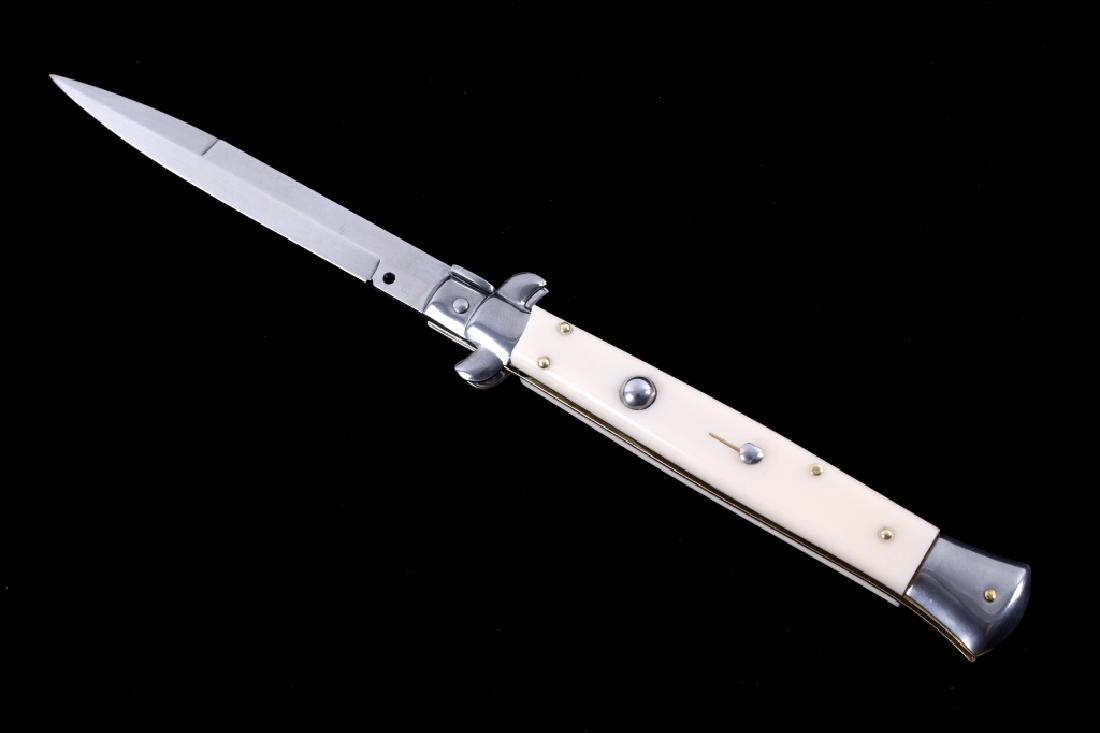 Frank Beltrame Italian Picklock Switchblade: This is an original handmade Italian picklock switchblade knife from renowned maker Frank Beltrame. The knife features a stiletto bayonet style full grind front and half grind rear blade that is paire