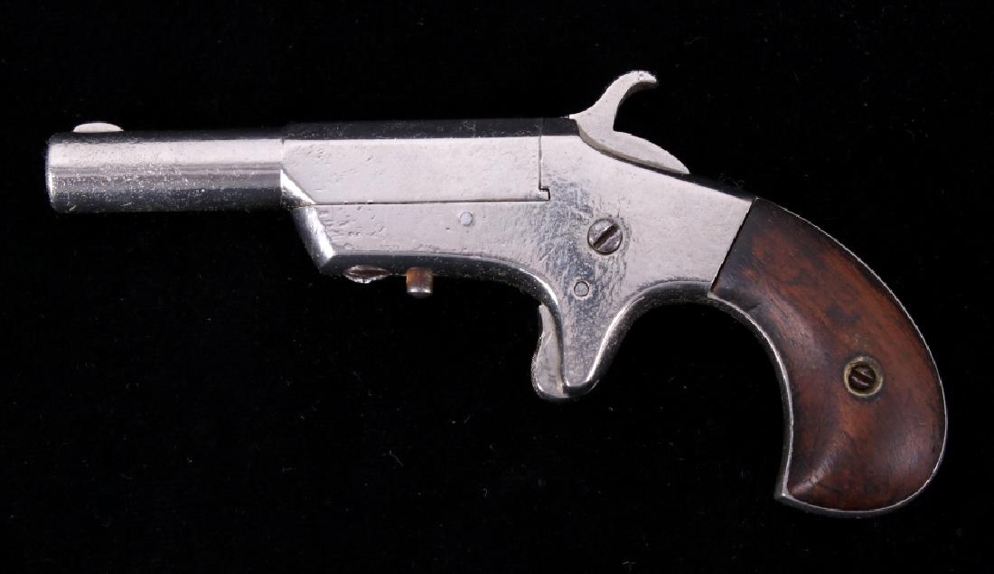 Hopkins & Allen XL .22 RF Single Shot Derringer: For your consideration is a Hopkins & Allen XL single shot derringer pistol. This single shot pistol is chambered in .22 RF. The 2 13/16" barrel is marked on the top "XL Single Shot 22 Cal." The firea