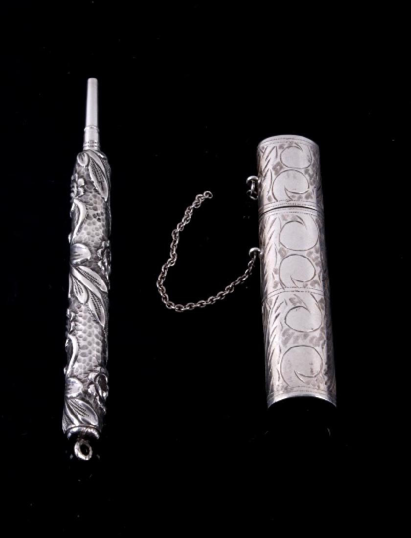 Victorian Chatelaine Sterling Silver Pencil & Case: The lot features an original Victorian Chatelaine set of sterling silver tooth pick holder and pencil. These would have been displayed on a Chatelaine, which was a decorative belt hook or clasp worn a