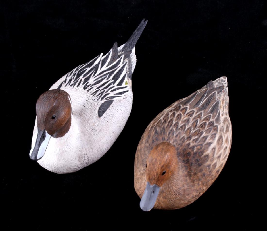 Pintail Drake & Hen Carved Decoy by Justin Hogan: For your consideration is a lovely Pintail drake and hen hand carved decoys by Justin Hogan. The drake shows intricate details to the feathers and a wonderfully well done paint job. The hen also shows