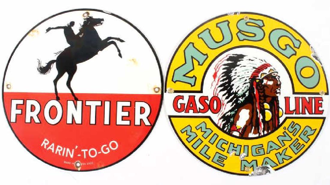 Porcelain Enamel Gasoline Advertising Signs: Featured in this lot we have a pair of porcelain enamel gasoline advertising signs. This pair of contemporary signs consists of a Frontier and Musgo advertising signs. The signs show porcelain enamel 