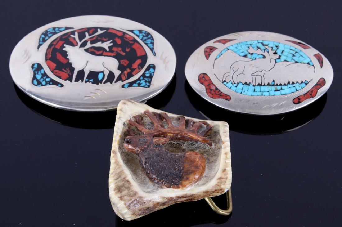 Collection of Elk Theme Silver and Bone Buckles: For your bidding pleasure is this Collection of Elk Theme Buckles Two Silver and One Bone. The first buckle shows a silver buckle with an intricate pattern of chipped turquoise in semi triangular patt