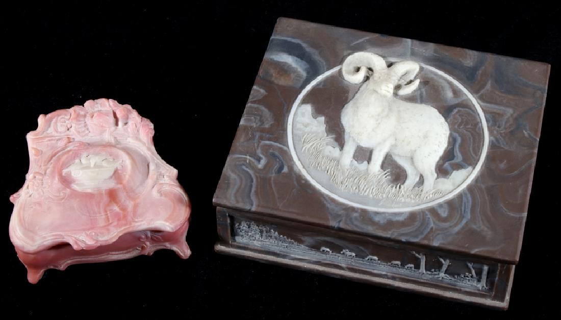 Handcrafted Incolay Stone Jewelry Boxes: Offered in this lot we have a pair of handcrafted incolay stone jewelry boxes originating from the early to mid 20th century. The pair consist of one large and one smaller stone jewelry boxes. The fir