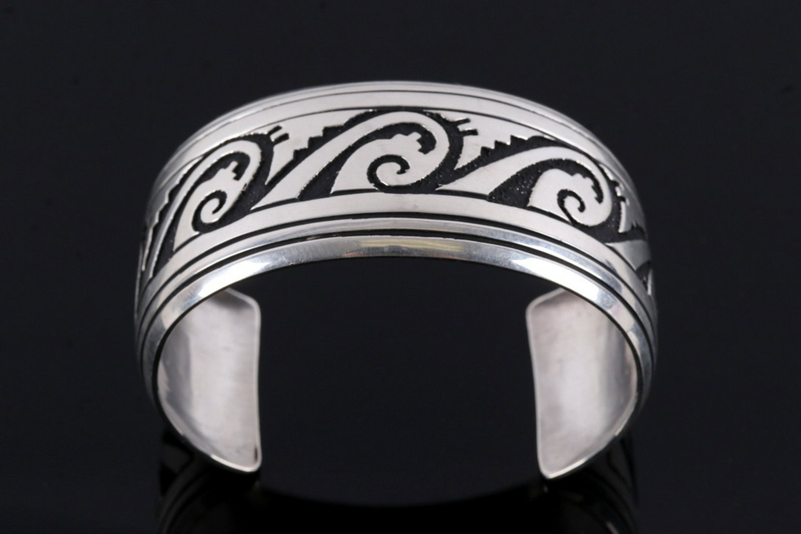 Navajo Thomas Singer Sterling Silver Bracelet: Included in this lot is a Thomas Singer Navajo Native American Sterling Silver Bracelet. Tommy Singer was a World Famous Navajo Silversmith and his distinct style of Indian Jewelry is recognized the w