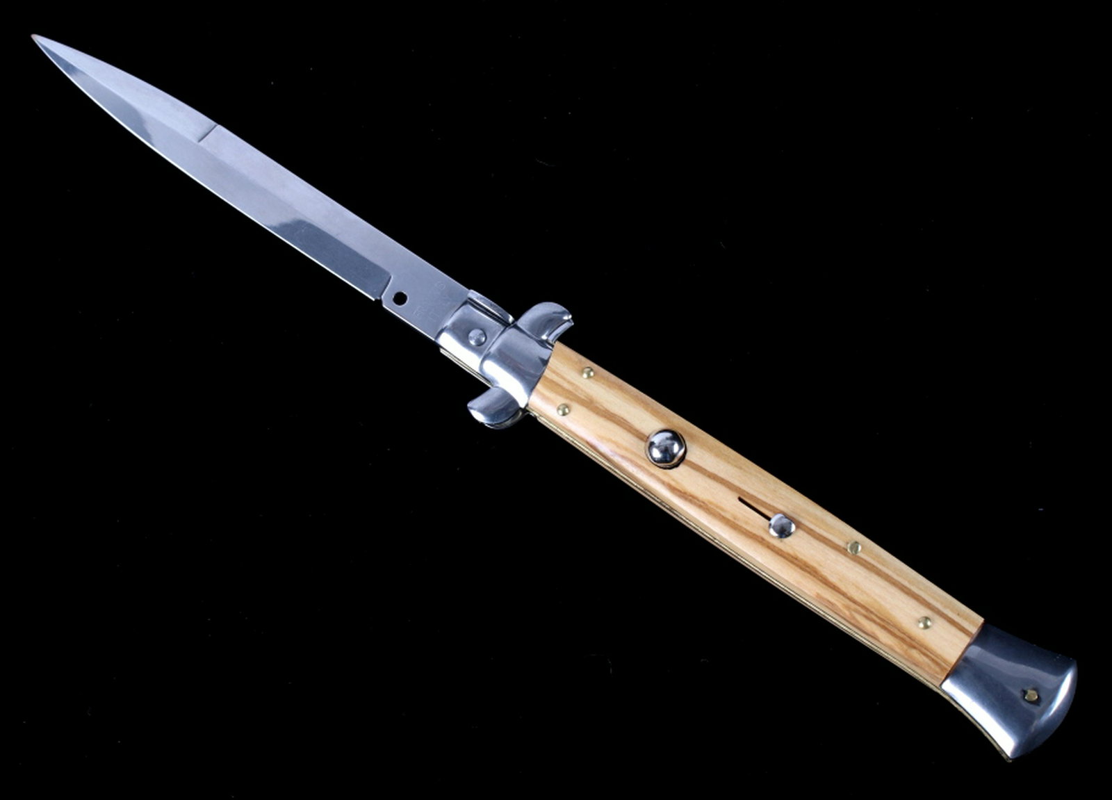 Frank Beltrame Italian Exotic Picklock Switchblade: This is an original handmade Italian picklock switchblade knife from renowned maker Frank Beltrame. The knife features a stiletto bayonet style full grind front and half grind rear blade that is paire