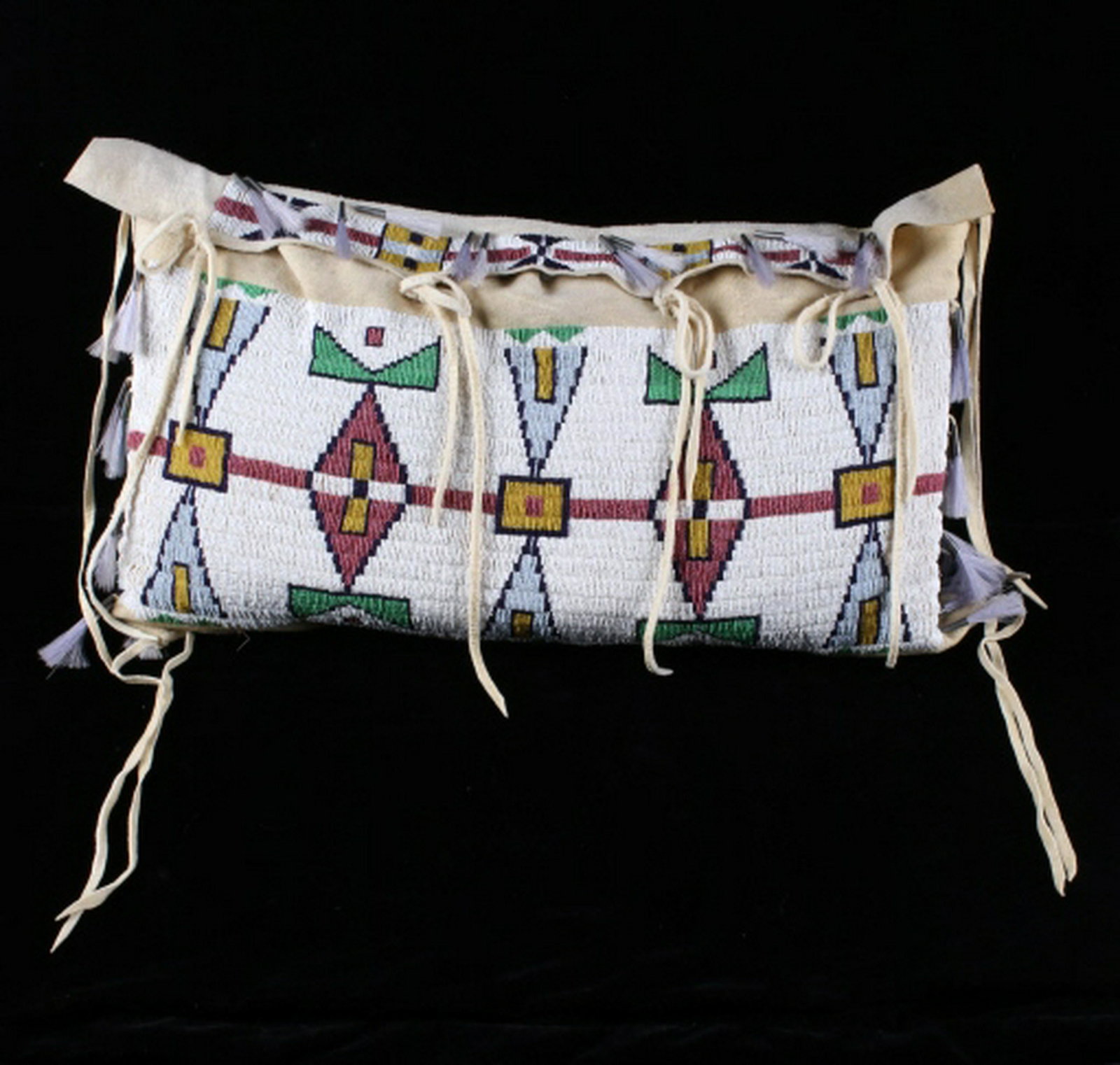 RARE Lakota Sioux Fully Beaded Possible Tipi Bag: The lot features a fully front beaded tipi possible bag from the Lakota Sioux American Indians. The bag shows an Indian tanned buckskin hide construction that is covered in all 19th Century 12-13 ‘C