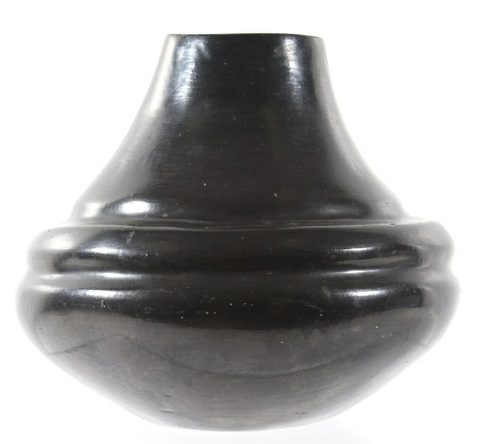 Santa Clara Black on Black Pottery c1920 ex-Sundog: This is an exceptional large black on black pottery jar or bowl from the Santa Clara Pueblo Native American Indians dating from circa 1920 from the historic Sundog Bruce VanLandingham collection. The 
