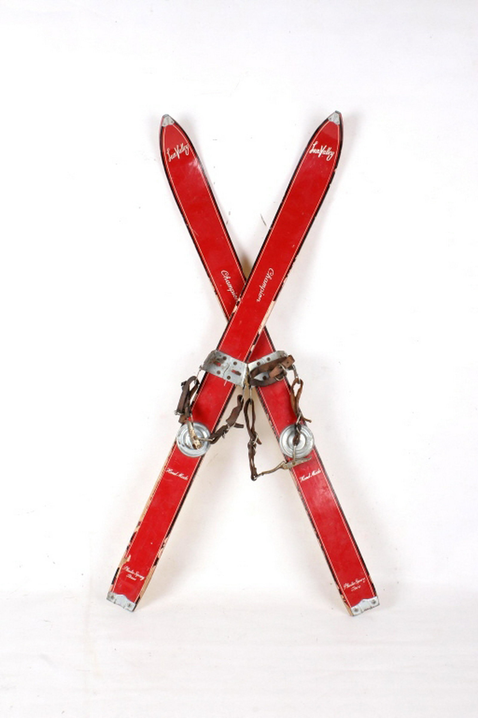 Handmade Children's Champion Skis and Poles: Offered for your bidding pleasure are these Handmade Children's Champion Skis and Bamboo Poles. These skis are from Sun Valley, Idaho. These skis show a sturdy wood construction with a vibrant red pla
