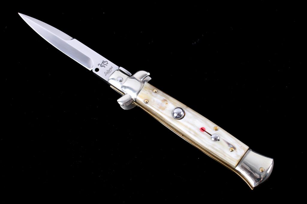 Latama Cutlery Italian Picklock Switchblade: The lot features an authentic original Latama Cutlery primo “Walts Classic” model picklock automatic switchblade made in Maniago, Italy. The Latama Walts Classic switchblade is considered the “C