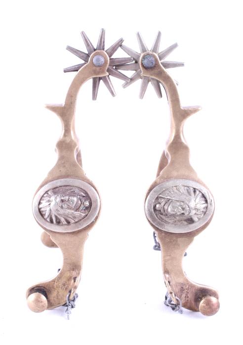 Buermann Hercules Bronze Indian Chief Head Spurs: For your consideration is a pair of Buermann Hercules Bronze Indian Chief head spurs. August Buermann immigrated to the US from Germany in 1864. After fighting in the Civil War Buermann returned to Ne