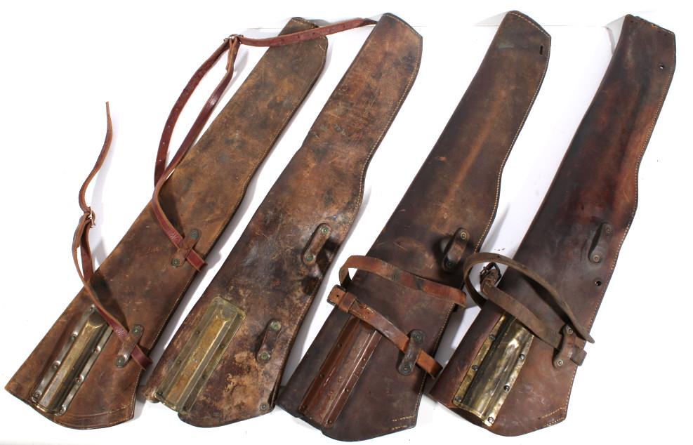 WWII M1 Garand Rifle Cavalry Saddle Scabbard: Featured in this lot we have a a collection of four World War 2 Cavalry saddle rifle scabbard for M1 Garand rifles originating from the early to mid 20th century. The rifle scabbards are most likely f