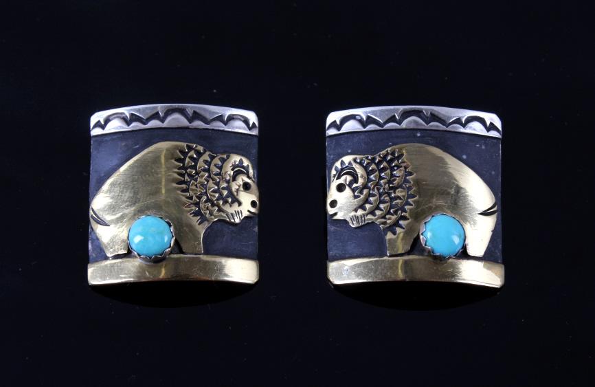 Navajo T. Singer Sterling Silver & Gold Earrings: Available for your bidding pleasure we have this pair of Navajo Thomas Singer sterling silver and gold earrings. Singer is thought to be one of the most important and greatest contemporary silversmith
