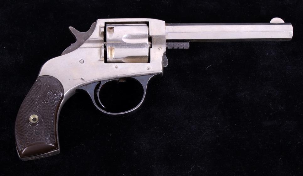 H&R "The American" .32 S&W Double Action Revolver: This is a Harrington & Richardson "The American" double action revolver chambered for the .32 Smith & Wesson caliber. The revolver is a first model, second variation, and originates between 1888-1897.