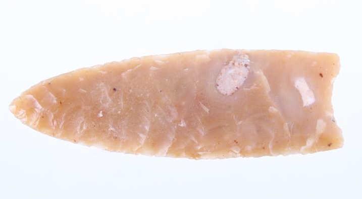 Clovis St. Louis Co. Fluted Point 14000-10000 BP: This is an outstanding authentic ancient pre-historic fluted Clovis St. Louis large point. The point shows a rare Crescent Quarry Flint material having a slight brownish / yellow / tan coloring with r