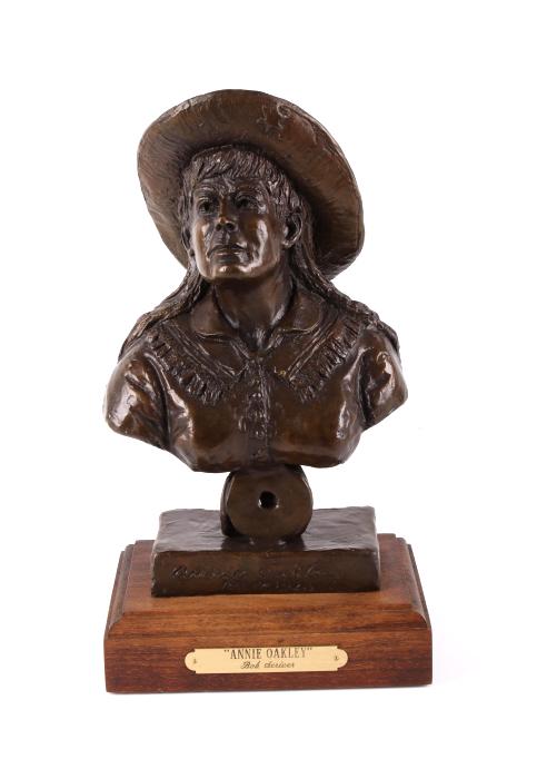 Original Bob Scriver Annie Oakley Bronze Sculpture: Included in this lot is an original Bob Scriver “Annie Oakley” bronze sculpture. Robert Macfie Scriver (1914-1999) was born in Browning, Montana (in the heart of the Blackfoot Indian Reservation)
