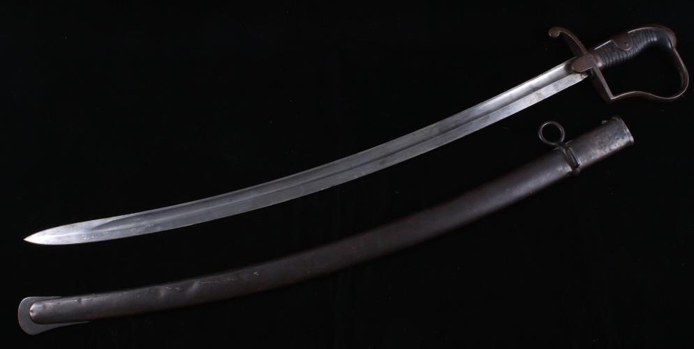 Imperial WWI Model 1873 German Cavalry Saber: Included in this lot we have a German Imperial model 1873 cavalry saber originating from WWI. The sword shows a steel single sided curved blade with a steel "D" guard with a leather and cord grip. The