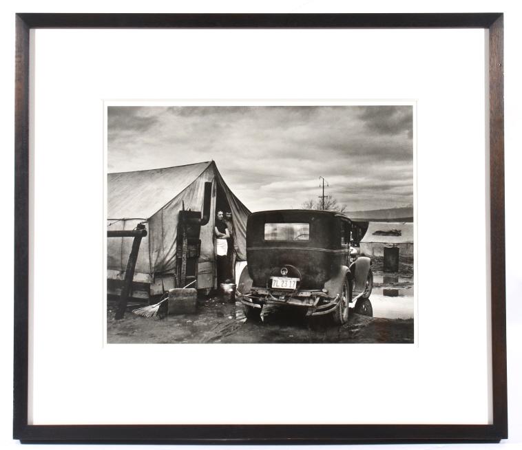 Horace Bristol Tent & Car Grapes of Wrath c. 1938: Available in this lot we have a Horace Bristol gelatin silver print titled "Car and Tent with Stove" originating from 1938. The photo depicts a man and woman looking out of a tent with a stove and sta
