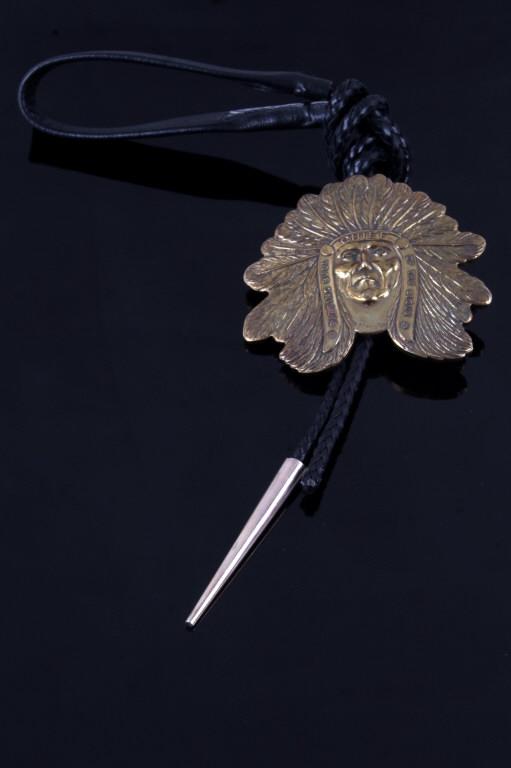Signed Frederic Remington Sitting Bull Bolo Tie: For your consideration is this Fredric Remington "Sitting Bull Chief of the Sioux" bolo tie signed by Buffalo Bill Cody on the back. This bolo's medallion shows Sitting Bull in his full headress on br