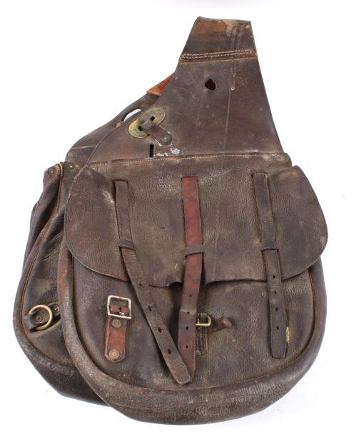 U.S. Military Cavalry Leather Saddle Bags: Included in this lot we have a U.S. Military Cavalry leather saddle bags originating from the early 20th century. The bags are constructed out of dark brown almost black leather with brass and copper 