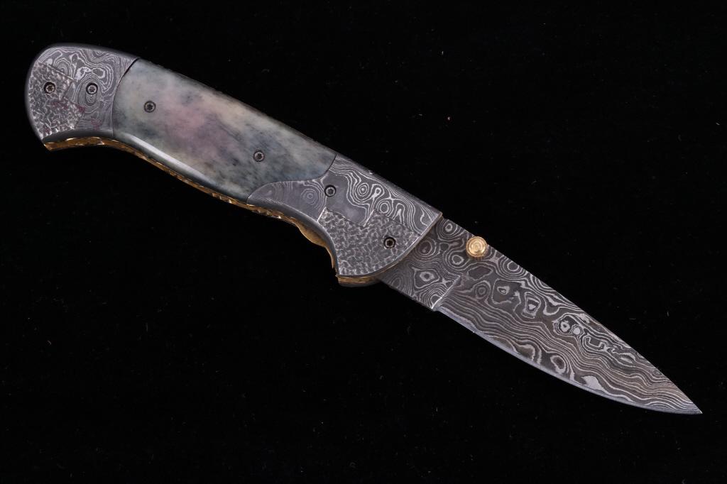 Navajo Dave Yellowhorse Damascus Bald Eagle Knife: We are proud to be one of the exclusive knife makers to offer David Yellowhorse custom Damascus pocketknives. David Yellowhorse has transformed this Damascus knife into visions of his Navajo heritage 