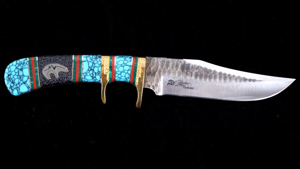 Navajo D. Yellowhorse Turquoise Bear Heart Knife: Offered in this lot is one of the best David Yellowhorse custom knives offered for sale, a VG-10 stainless blade having polished brass double bolster finger well with turquoise, malachite, onyx, red c