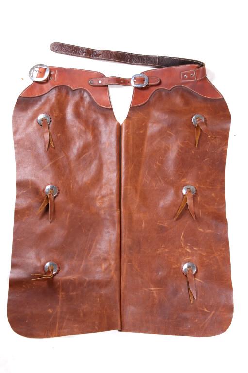 Mid 1900's Montana Concho Batwing Chaps: For your consideration is this pair of Montana made Batwing chaps shown with six conchos in total and from the mid 1900's. This is a good pair of chaps with great sturdy construction. The measurements