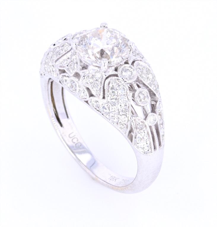 Art Deco 2.12 ct. Diamond 18K Gold Ring: The lot features a fine 2.12 carat Diamond 18K gold ring showing a nice early age. The ring shows a fantastic Art Deco 1920’s style having a gorgeous filigree, engraved and cluster set 18 karat whit