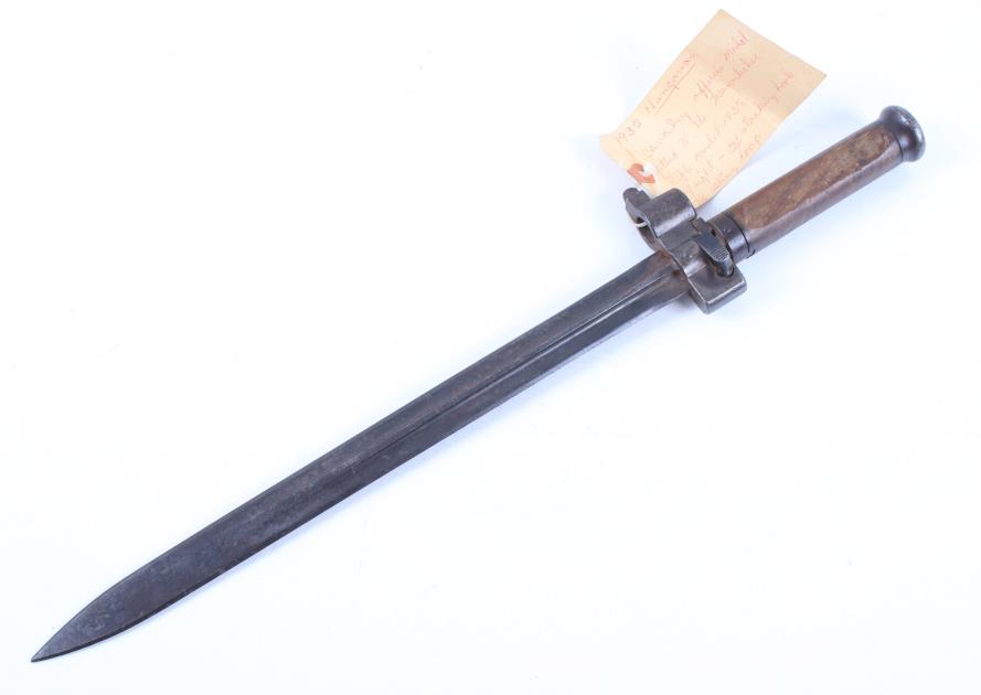Hungarian Model 35 Pre WWII Cavalry Bayonet: Featured in this lot we have a Hungarian model 35 pre WWII cavalry bayonet. The bayonet was is designed to fit the 8 mm. Puska 35.M rifle originating from 1935. The piece displays a steel blade, metal