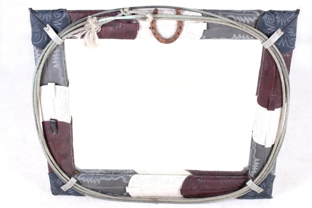 Leather Wrapped Western Theme Mirror c. Mid 1900s: For your bidding pleasure is this leather wrapped western theme mirror circa mid 1900's. This is a wonderful western theme mirror showing the leather from multiple pairs of boots wrapped around the fr