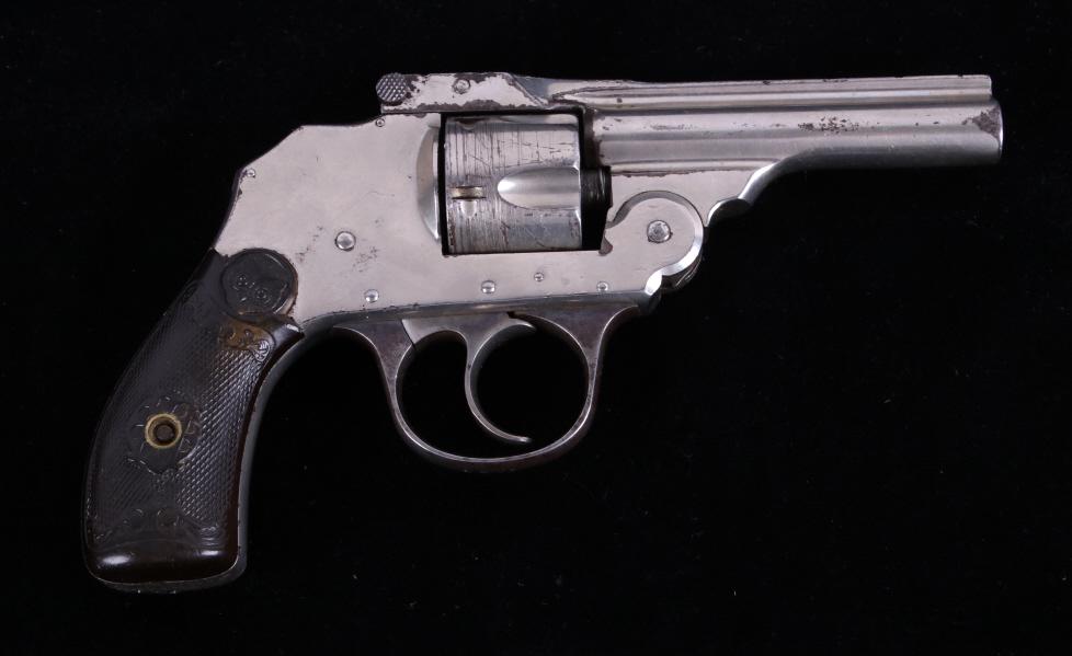 Iver Johnson Safety Hammerless .32 CF Revolver: This is an early Iver Johnson Arms Model Safety Automatic Hammerless double action revolver in a 32 CF (center fire) caliber. The revolver shows a bright nickel finish with original hard rubber grips 