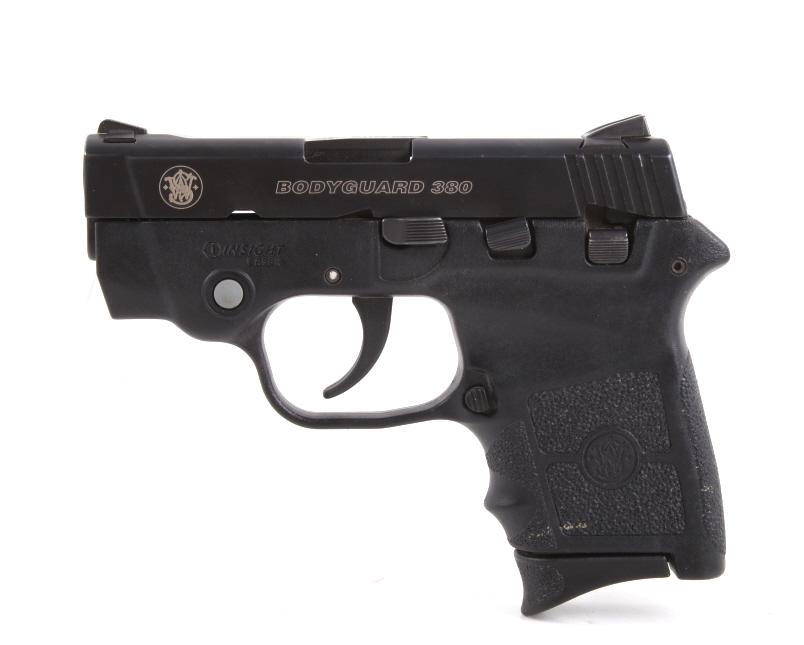 Smith & Wesson Bodyguard .380 Pistol w/ Laser: Included in this lot is a Smith & Wesson Bodyguard .380 pistol with laser light. This compact and sleek, .380 caliber pistol delivers personal protection in an easy-to-carry, comfortable platform. Cha