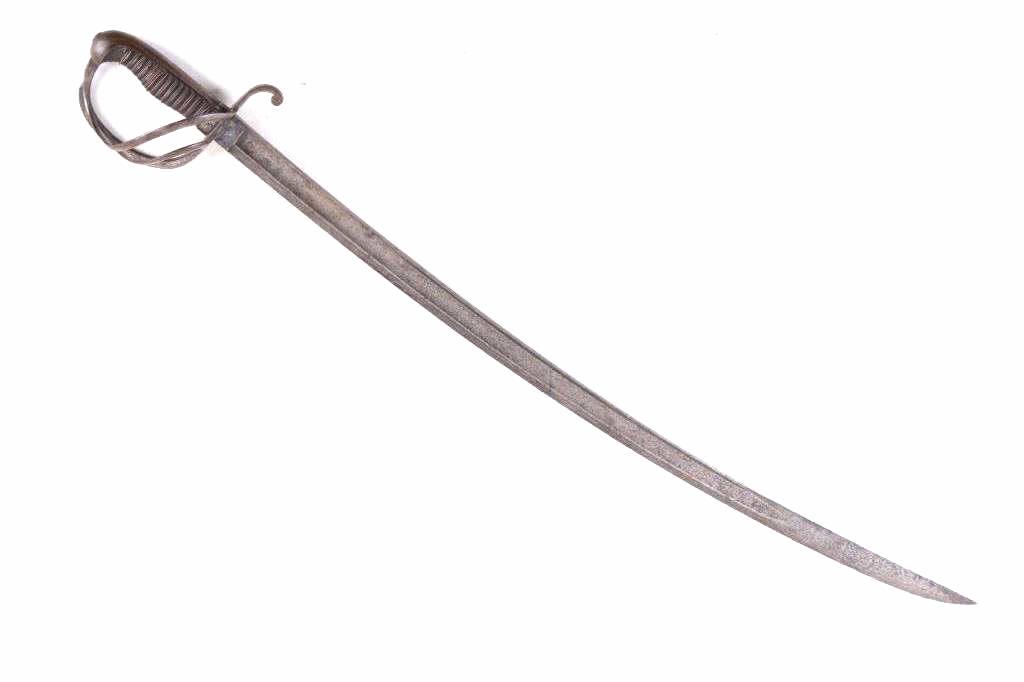 19th Century Spanish Cavalry Sword: For your bidding pleasure is this 19th century Spanish cavalry sword. This is a good cavalry sword showing a dull blade a T rib above the fuller. The sword shows a basket hilt. This sword shows good c