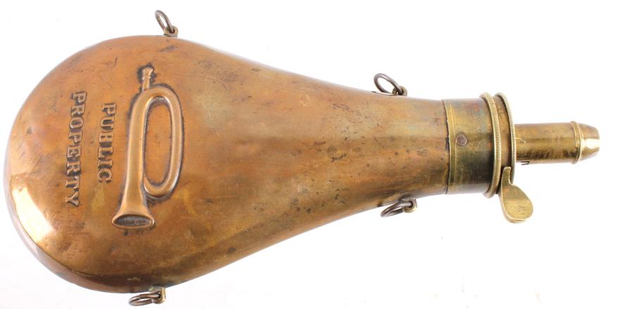 Brass Gun Powder Flask by A.M. Flask & Cap: In this lot we have a beautiful 19th century brass gun powder flask by A.M Flask & Cap. This flask has four rings on the sides, two on each side that allows you to be able to attach it to a string or