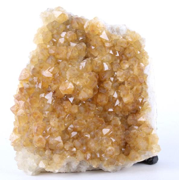 Large Citrine Crystal Geode: In this lot we offer a large Citrine geode. The geode measures 9" X 9' at the wide points and up-to 4" thick. The back has been coated with black paint and has a concrete backing to make it stand for 