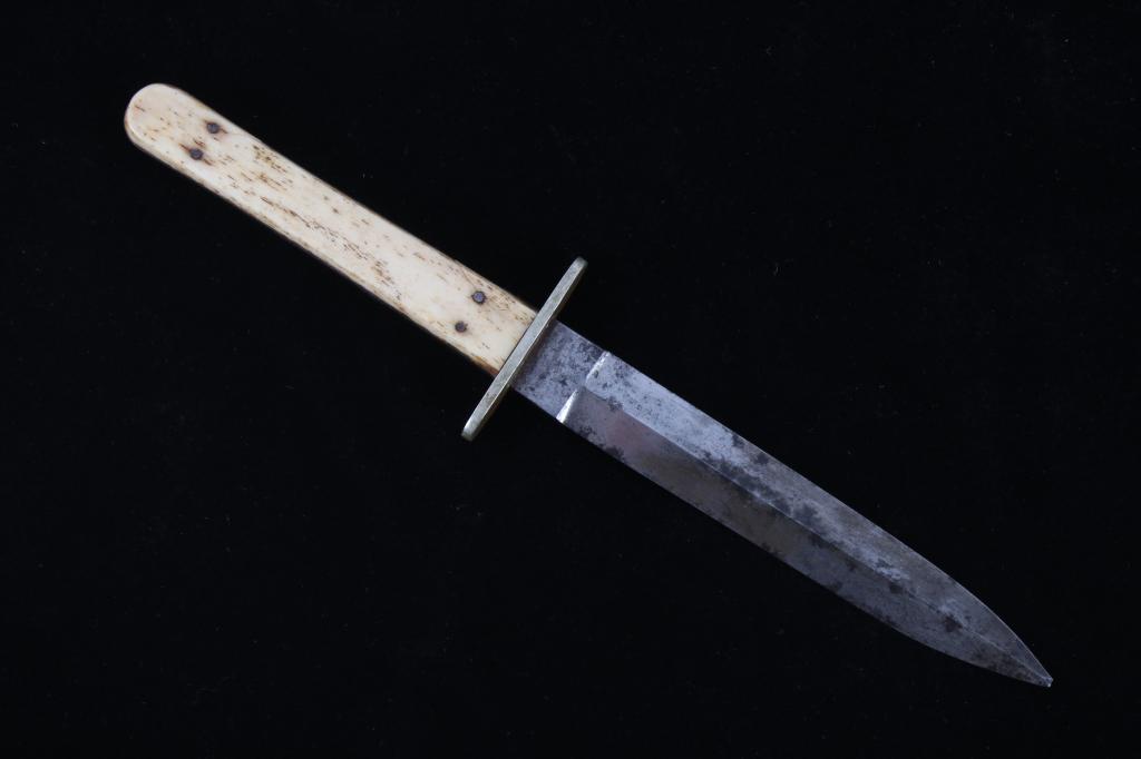 19th C. Manson Sheffield Walrus Tusk Boot Knife: For your consideration is this 19th century Manson Sheffield walrus tusk boot knife/ dagger. Showing a beautiful construction showing a full tang double sided dagger style boot knife with a slightly e